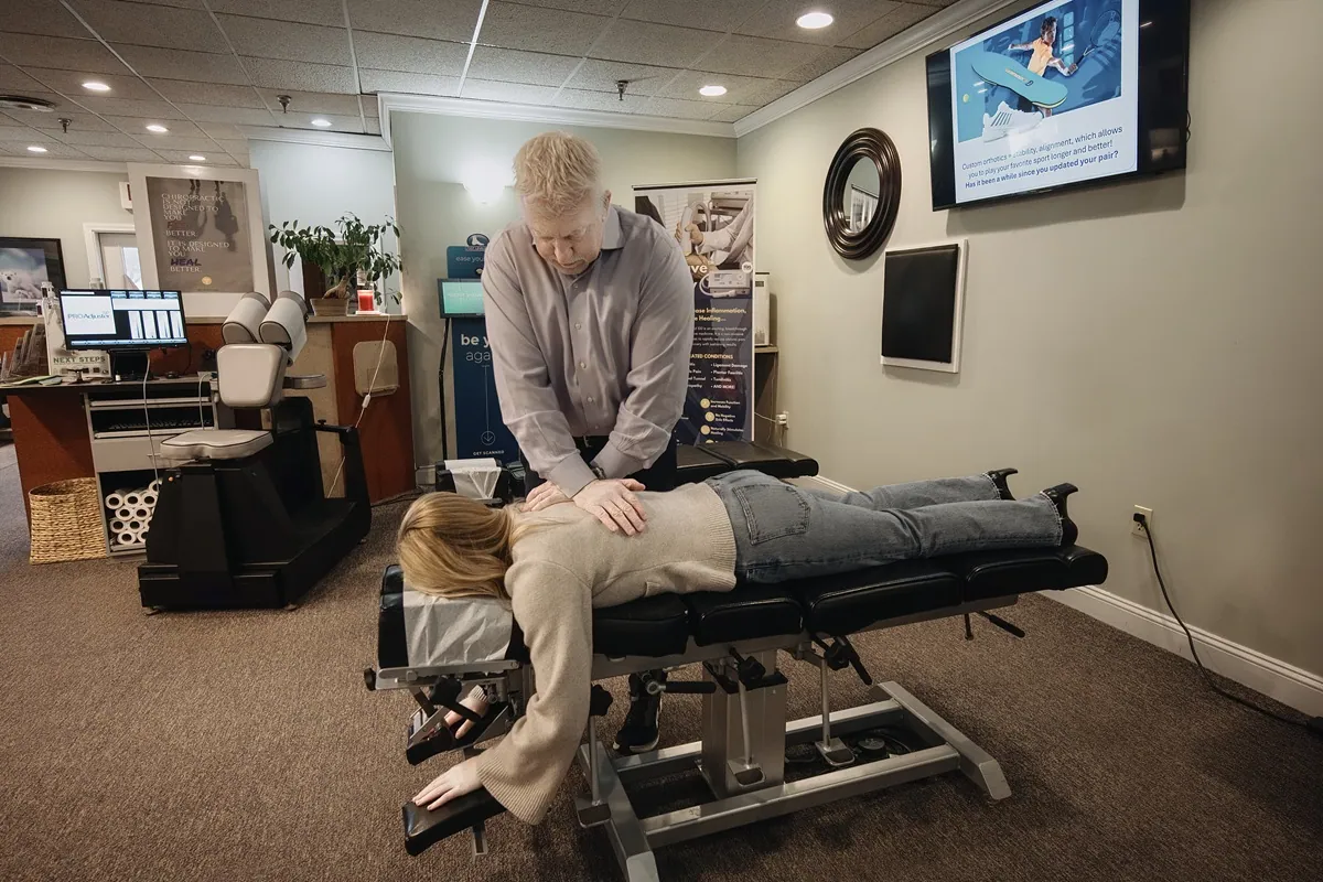 Chiropractic adjustment spinal manipulation back pain relief North Hampton NH